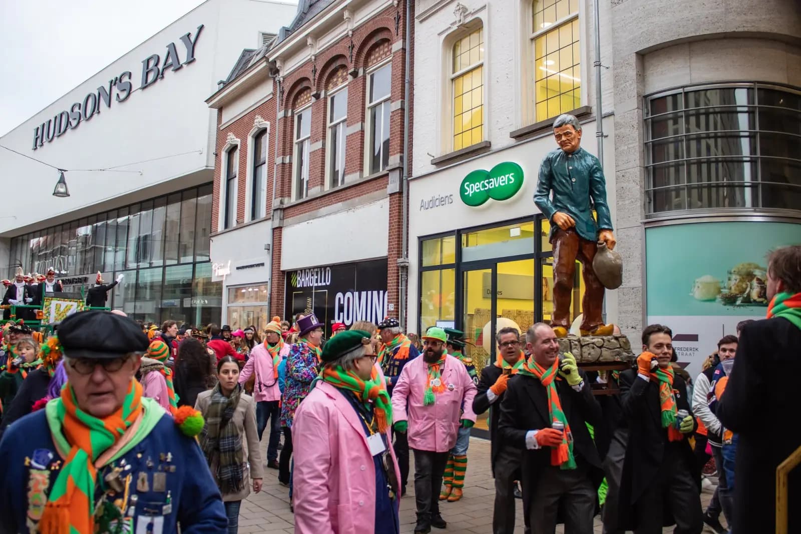 Carnival revellers in a shopping street in Tilburg during d’n Inhaol