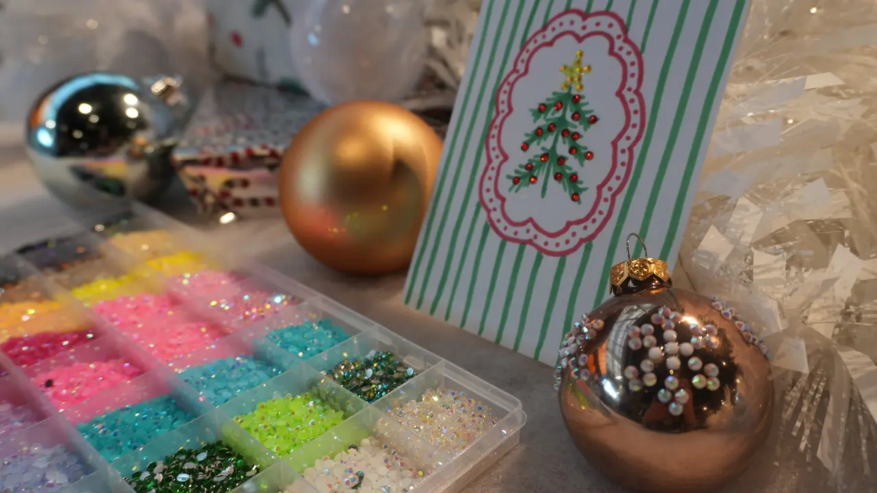 Bedazzling Christmas cards and Christmas baubles