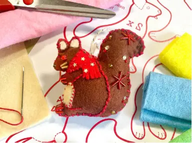 Making and decorating a felt animal