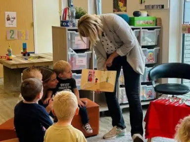 Reading aloud and playing in the Library