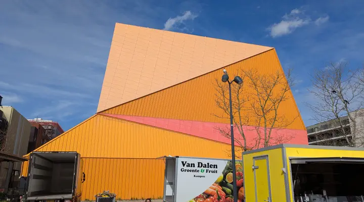 The bright-orange exterior of AGORA Theater Lelystad, the landmark theatre on Agorabaan in the city centre.