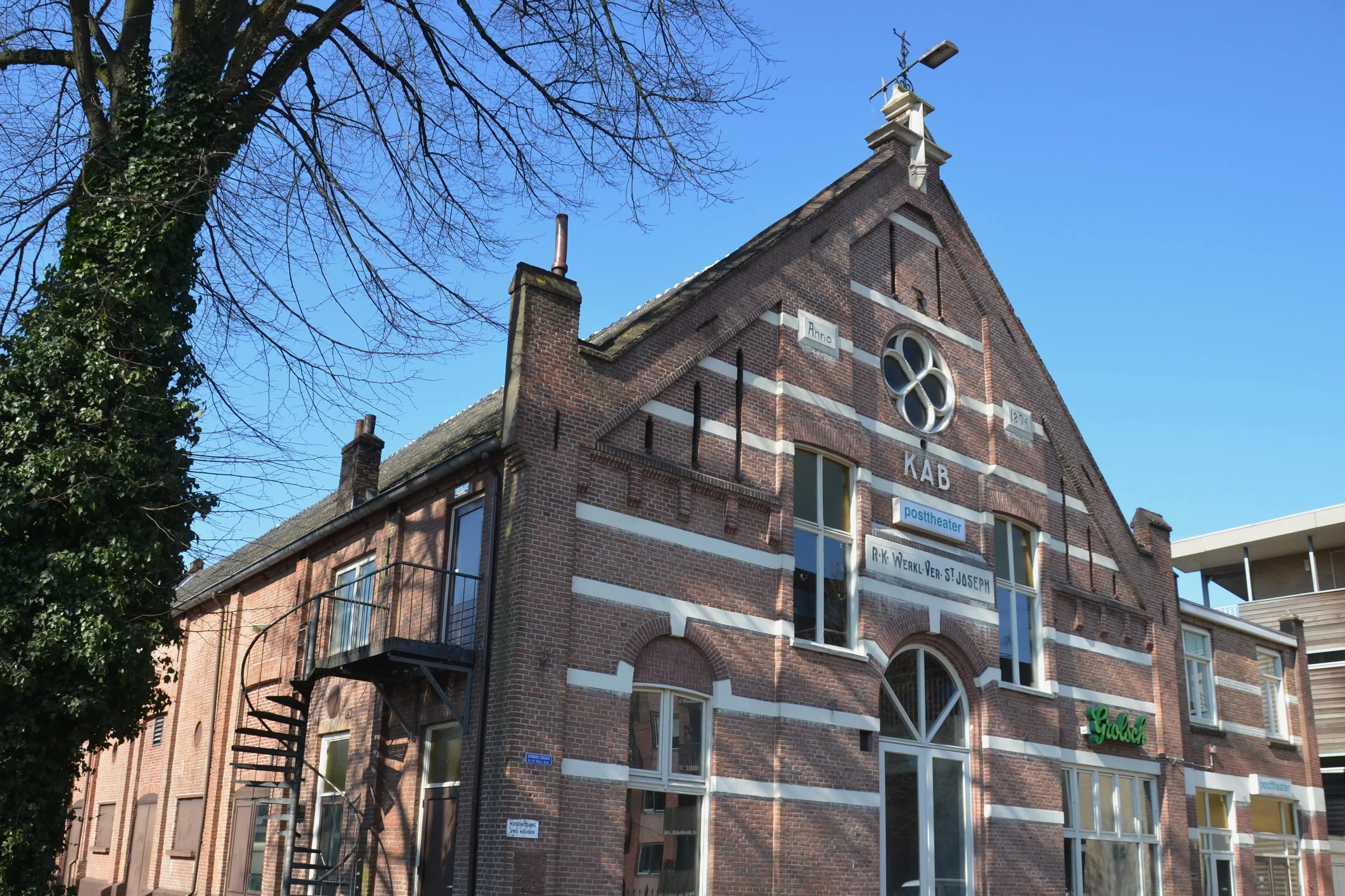 The neo-renaissance KAB building in Arnhem, home of Het Posttheater, seen from the street.