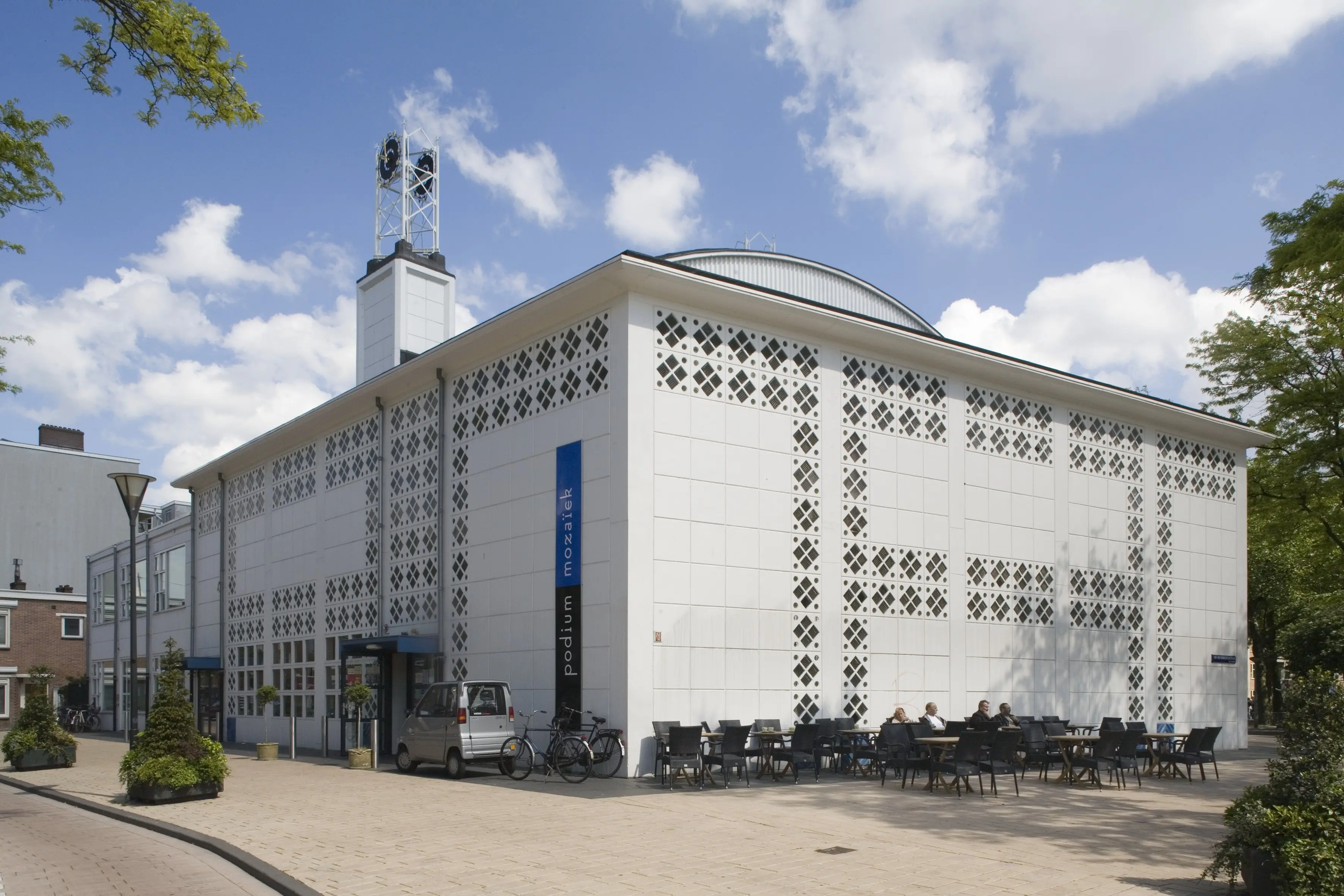 The west and south facades of the former Pniëlkerk, now Podium Mozaïek, seen from the street.