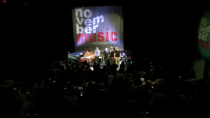 A concert in Verkadefabriek: Kayhan Kalhor and the Rembrandt Frerichs Trio on stage, with the audience in front.